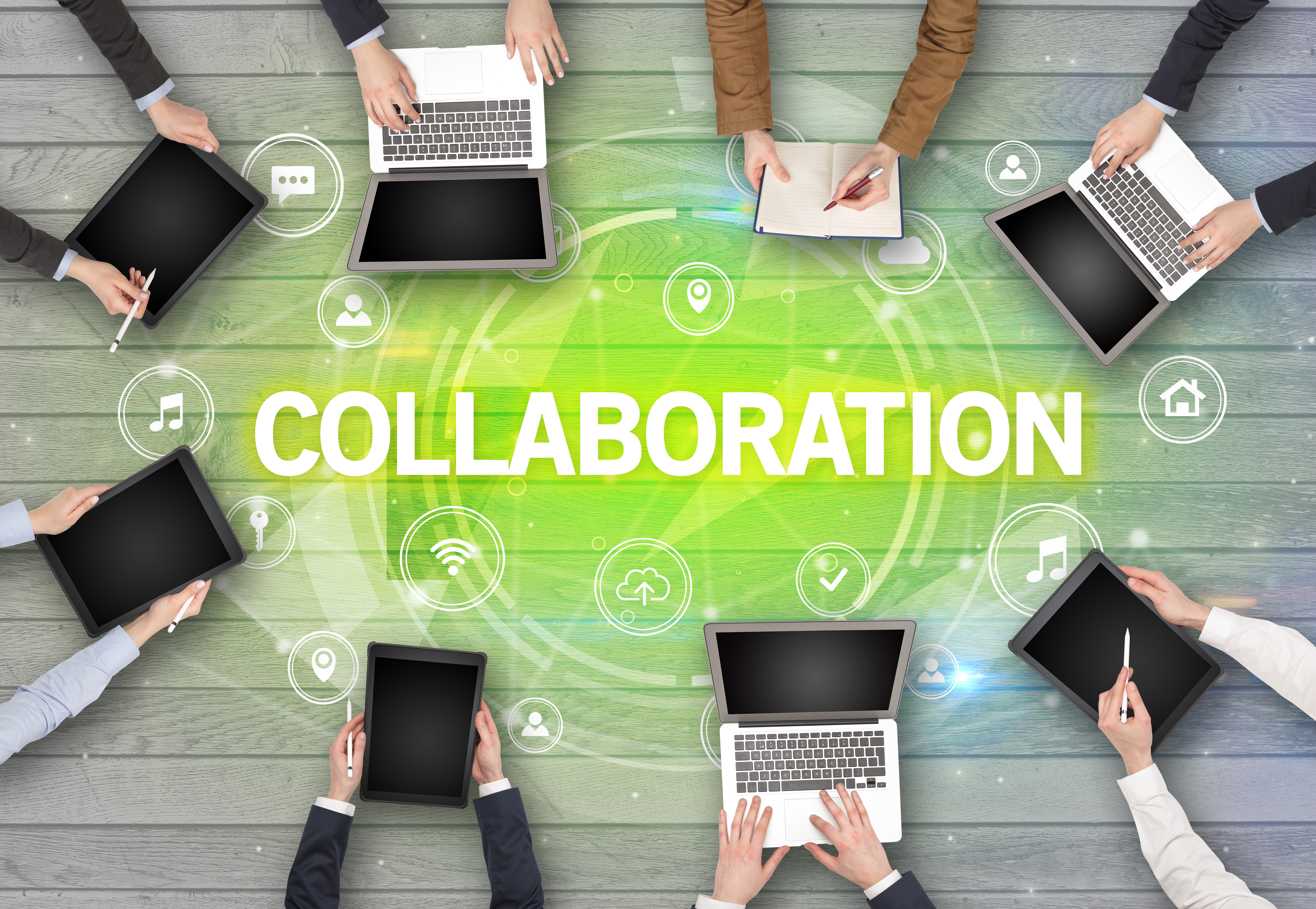 Group of people having a meeting with COLLABORATION insciption, social networking concept